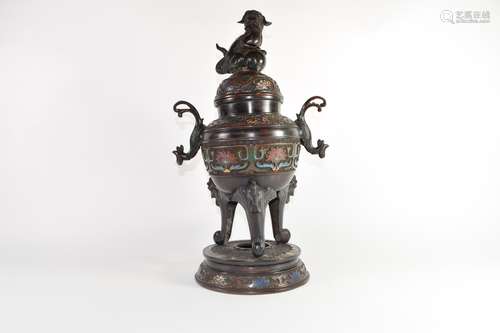 Large metal bronzed jar and cover with lion finial, decorated in cloisonne style, standing on