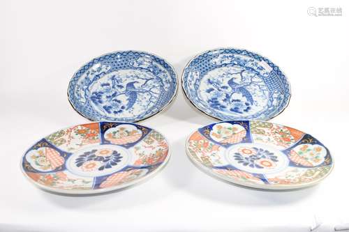 Pair of Japanese Imari style dishes and two further Japanese blue and white decorated dishes (4)