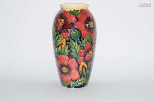 Modern Moorcroft vase with a floral design, the base marked 