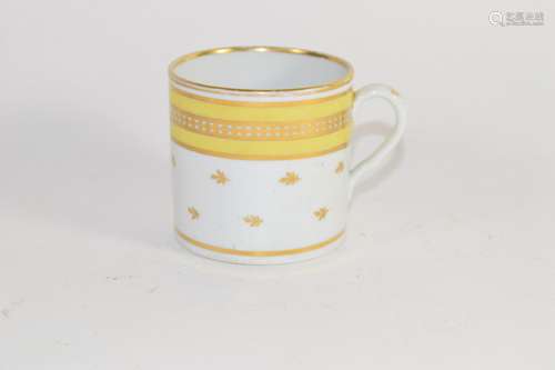 Coalport style coffee can with a yellow and gilt design, height 6cm high