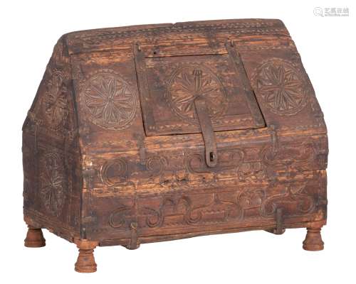 A Middle Eastern walnut bridal chest, decorated with carved geometric motifs, H 36 - W 42,5 - D 24 cm