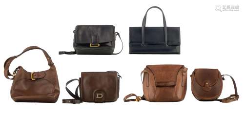 A collection of four brown leather handbags and two bleu leather handbags by Delvaux