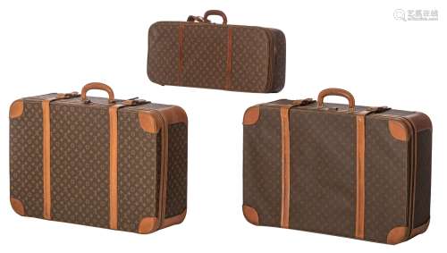 A collection of three Louis Vuitton travel suitcases, H 34 - 55 - W 75 - 80 - D 15 - 25 cm