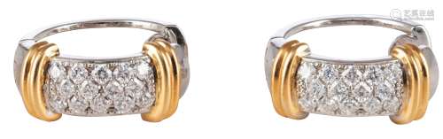 A pair of 18ct white and yellow gold stud earrings set with 14 brilliant-cut diamonds each, the total weight 11,5 g