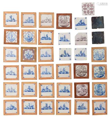 A large collection of 25 blue and white and manganese decorated Dutch Delftware tiles, depicting several pastoral and religious scenes, the corners decorated with a spider motif, 18thC, 12,5 x 12,5 cm. Added: two marb...