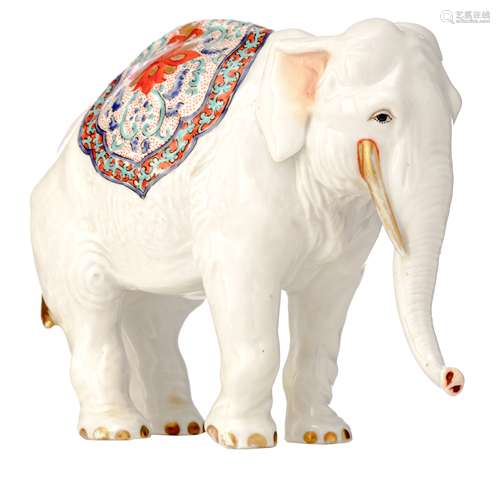 A polychrome and gilt decorated porcelain elephant, marked Chantilly, H 14,5 cm