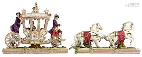 A polychrome and gilt decorated Saxony porcelain group of an abundantly decorated Rococo carriage, marked Aelteste Volkstedter Porzellanmanufaktur, H 37 - W 92 cm