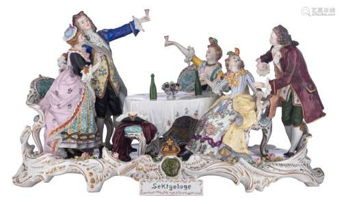 A large polychrome and gilt decorated Saxony porcelain group, titled 'Sektgelage', depicting the higher class drinking and laughing in a Rococo setting, marked 'Dresden Sitzendorf', H 28 - W 50 cm