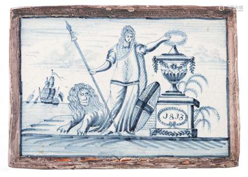 A plaque in blue and white and manganese purple porcelain, (English delftware) depicting, Britannia, possibly referring to the English victory in 1813 during the Napoleonic Wars, H 13,8 - W 19,4 cm