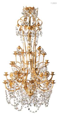 An imposing gilt bronze chandelier, royally decorated with cut crystal, H 160 - ø 82 cm