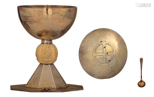 A silver 'martelé-decorated' modernist chalice set in the middle with an ivory relief cut nodus, especially made for a silver priest-jubilee of a non-named father: 'Dankbare herinnering zilveren priester jubilé(sic) v...