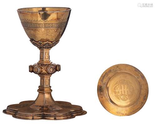 A silver and gilt silver gothic Revival six-lobed chalice with engraved decoration, inscribed 'Brugis 1879 - Capucinus Ecclesiae', made by J. Van Damme - Bruges, with a gilt silver paten weight c 135 g - Ø 15,3 cm, a ...