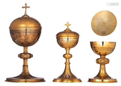 Two ciboria and one chalice with only the cup itself made out of silver / gilt silver, the feet and stem made out of silver-plated metal: the bigger one Gothic Revival, with cover and engraved with the Evangelists, th...