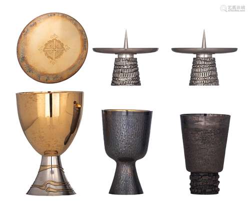 Three modernist silver and gilt silver chalices: one of which only the chalice matted silver/gilt silver, the foot silver-plated, H 15 cm - a ditto extra chalice, H 16 cm, and a bigger silver/gilt silver 835/000 chali...