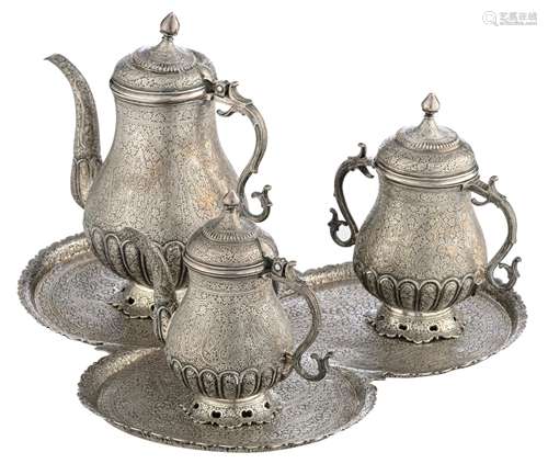 A Persian inspired horror vacui decorated tea set, no visible hallmarks but tested on silver purity, H 14 - 20 - ø 34 cm (the tray), total weight: ca. 2.000 g