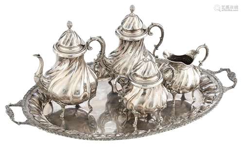 A four-piece Rococo silver 900/000 coffee and tea set with ivory handles, on a matching tray, H 11,5 - 22 cm - 34 x 56 cm (the tray), total weight: ca. 3.350 g