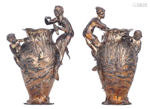 A pair of Art Nouveau silver plated vases, decorated with a child fishing in a pond, the handles shaped like a mermaid and a merman, marked WMF Württembergische Metallwarenfabrik AG, early 20thC, H 29 cm