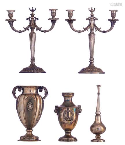 A pair of silver Neoclassical candlesticks, Belgian, maker's mark P.A., 800/000. Added: a silver Neoclassical vase, the handles shaped like heads, French hallmark, maker's mark GB, 950/000. Extra added: a silver Histo...