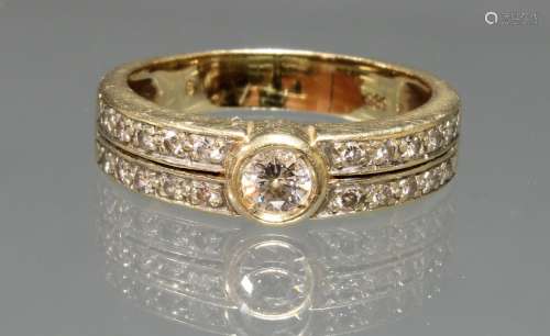 Ring, GG 585, 1 Brillant ca. 0.20 ct., 20 Brillanten zus. ca. 0.40 ct., 6 g, RM 18