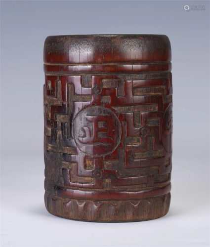 A CHINESE CARVED BAMBOO ROOT BRUSH POT