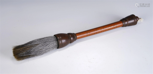 A CHINESE ENGRAVED BAMBOO BRUSH