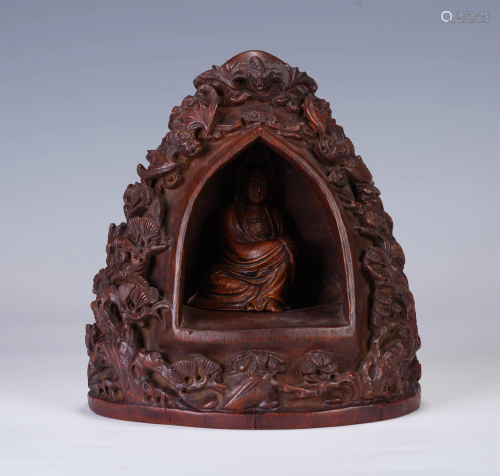 A CHINESE CARVED HARDWOOD BRUSH POT
