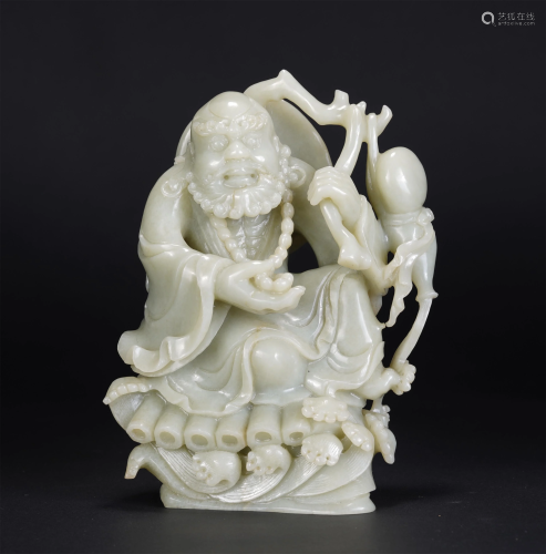 A CHINESE WHITE JADE CARVING OF A LUOHAN