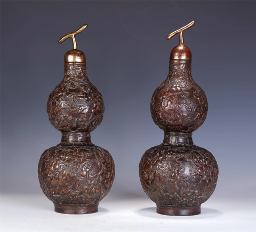 A PAIR OF CHINESE CARVED HARDWOOD DOUBLE-GOURD VASES