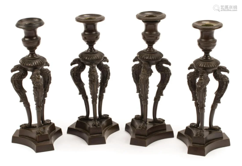Four Empire-Style Patinated Bronze Candlesticks