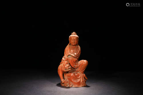 A BOXWOOD CARVED GUANYIN RIDING BEAST ORNAMENT
