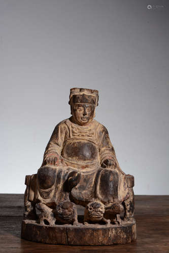 WOOD CARVED AND PARCEL GILT 'CELESTIAL' SEATED FIGURE