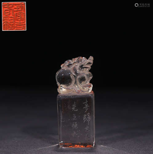 A NATRUAL CRYSTAL CARVED BEAST HANDLE SEAL