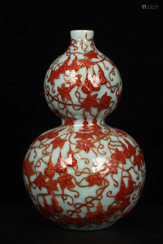 QING DYNASTY QIANLONG PERIOD--CELADON GLAZING WITH IRON RED FOLIAGE EMBOSSMENT GOURD VASE