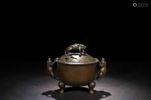 A BRONZE THREE-LEGGED INCENSE BURNER