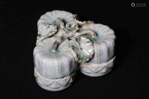 CELADON AND CARVED TRI-LINKED 'LOTUS' BOX WITH COVER