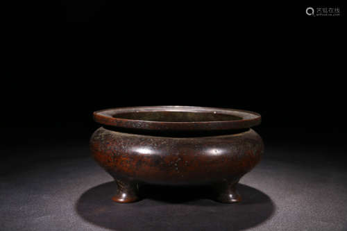 A BRONZE THREE-LEGGED INCENSE BURNER