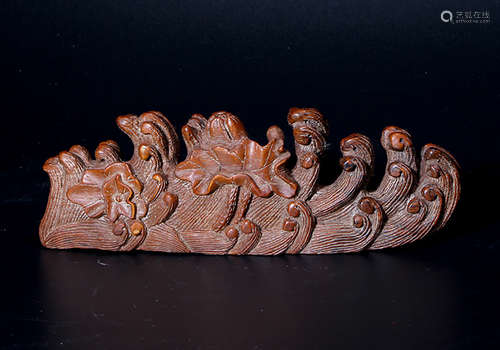 A BAMBOO CARVED ORNAMENT