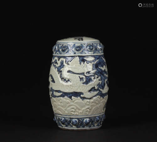 A BLUE AND WHITE DRAGON RELIEF PORCELAIN STOOL