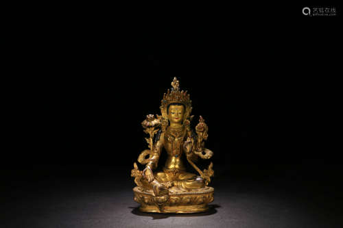 A GILD BRONZE TARA STATUE