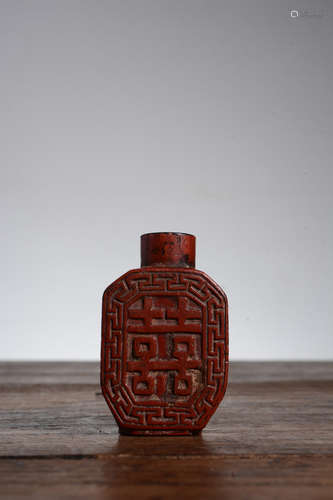 CINNABAR LACQUER CARVED 'DOUBLE HAPPINESS' SNUFF BOTTLE