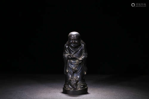 A ROSEWOOD CARVED FIGURE ORNAMENT