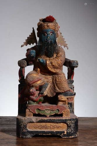 WOOD CARVED AND PARCEL GILT 'GUAN YU' SEATED FIGURE