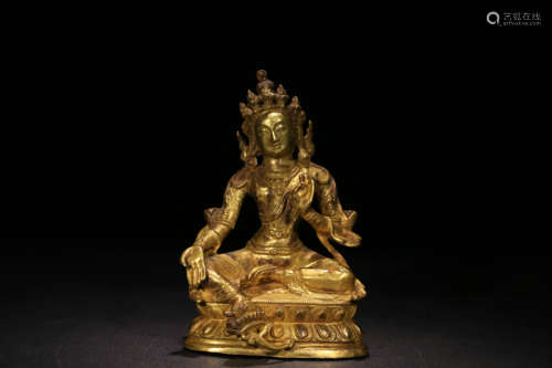 A GILD BRONZE TARA STATUE