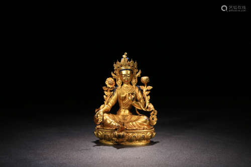 A GILD BRONZE TARA STATUE