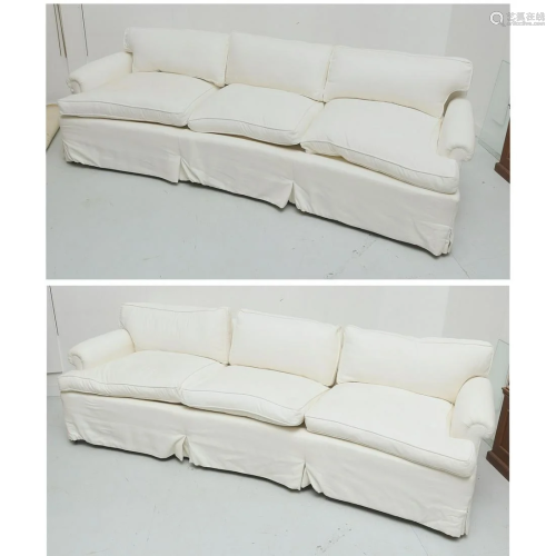 Nice pair Designer white upholstered sofas