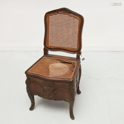 Louis XV caned beechwood commode chair