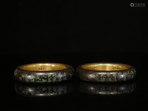 A PAIR OF GILT-BRONZE INLAID AGALLOCH BANGLES.QING