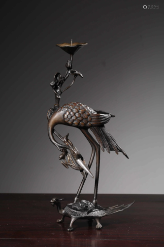 A BRONZE CRANE ON TURTLE CANDLESTICKER.QING PERIOD