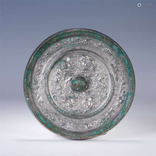 A CHINESE BRONZE ROUND MIRROR WITH FOO-DOG PATTERN