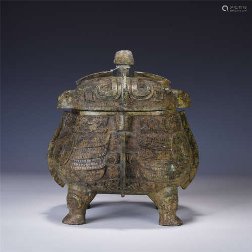 A CHINESE BRONZE FOUR FOOT RITUAL